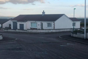 Two bed bungalow with garage and hot tub